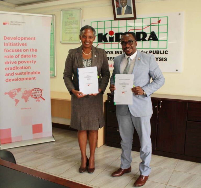KIPPRA Executive Director Dr Rose Ngugi (left) and Development Initiatives Director of the East Africa Hub Mr. Stephen Chacha (right) pose for a photo after the MOU signing