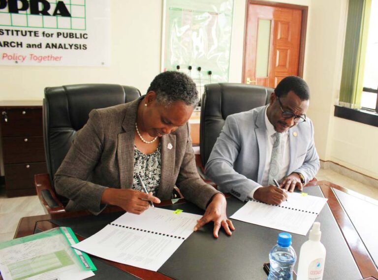 KIPPRA Executive Director Dr Rose Ngugi (left) and Director of the East Africa Hub Mr. Stephen Chacha (right) sign the MOU on mutual areas of collaboration between the two institutions.