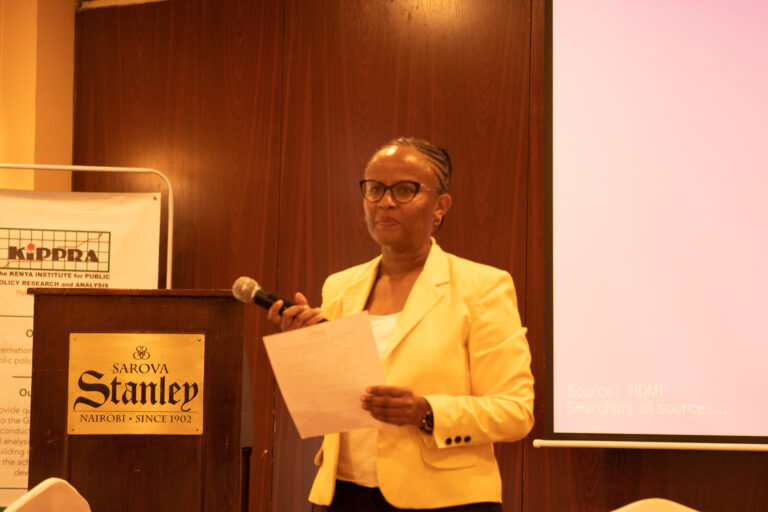 Director, Corporates Services, giving her remarks during the validation workshop