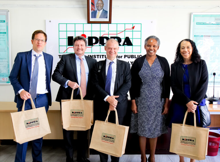 KIPPRA Executive Director Dr Rose Ngugi (right), IMF Deputy Director, Africa Department, Ms Catherine Patillo (further right), IMF Resident Representative Mr Tobias Rasmussen(centre) and other members of IMF pose for a group photo during the visit