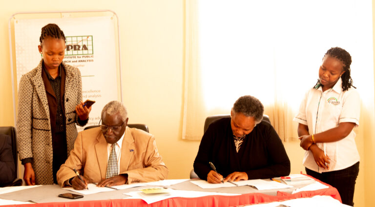 KIPPRA Executive Director Dr Rose Ngugi (right) with the Vice Chancellor Laikipia University  Prof. Joseph K Rotich (left) during the signing of the MOU at KMPUT Event