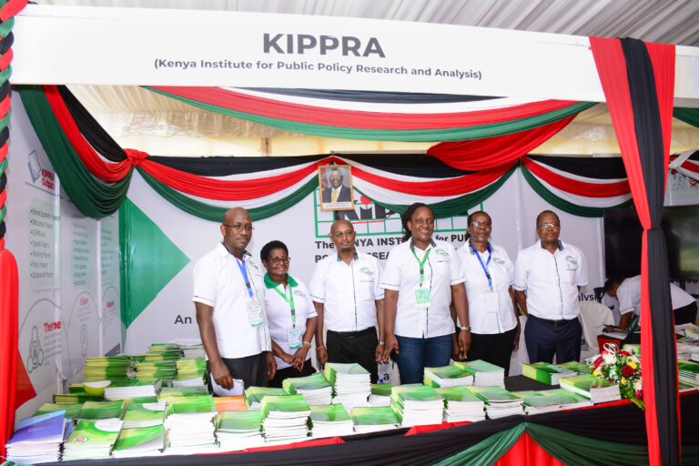 KIPPRA Staff exhibiting the Institute's publications at the 6th KIPPRA Annual Regional Conference
