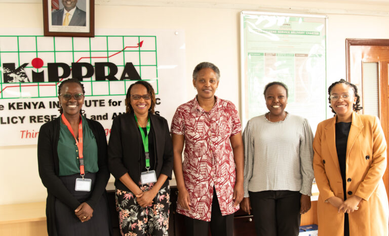 KIPPRA Executive Director Dr Rose Ngugi (centre) with Ms Ann Ndung u (right),Ms Waceera Kabando (second right) from Oxygene MCL and KIPPRA staff pose for a group photo during the visit