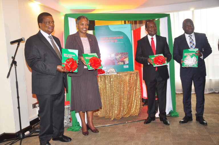 CS, National Treasury and Economic Planning, Prof. Ndung’u (right), PS, State Department for Economic Planning, Mr Muhati (further right) KIPPRA Executive Director Dr Ngugi (left) and KIPPRA Board Chair Prof. Ateng’ (further left) posing for a group photo with the Kenya Economic Report 2023 at the Launch.